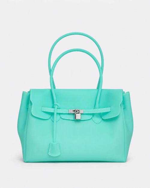 A structured turquoise handbag with double top handles, a front flap, and a silver turn-lock closure