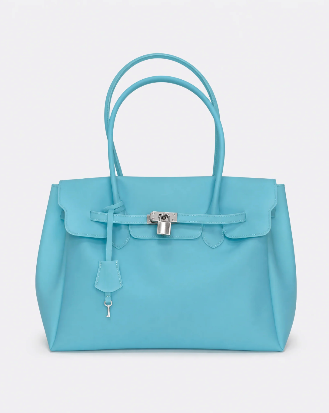 A light blue jelly handbag with double top handles, a front flap, and a silver padlock closure, photographed against a clean light gray background.